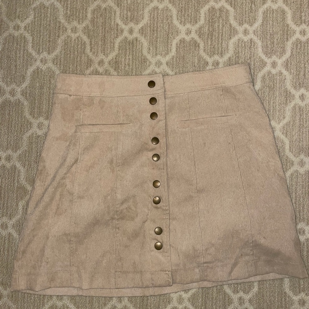 Lulu’s mini skirt. Corduroy with buttons. Size large. good shape, lightly worn.